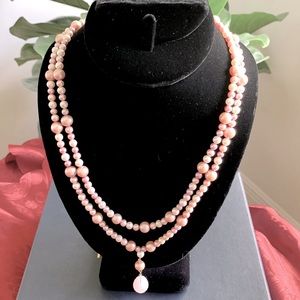 Fresh water pearl necklace. 2 rows with rose quartz pendant. 14K clasp